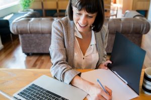 Business woman working from home.